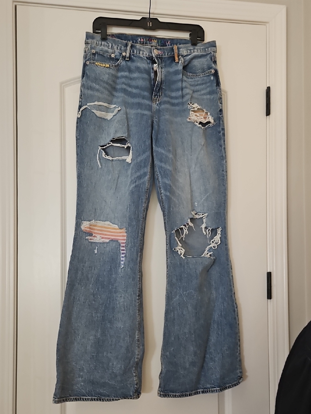 American Eagle Outfitters Distressed Blue Flare Jeans with Striped Patch